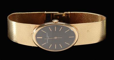 Appraisal: Baum Mercier gold wristwatch oval black dial signed Baum Mercier