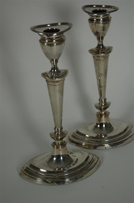 Appraisal: A pair of late Victorian table candle sticks T Bradbury