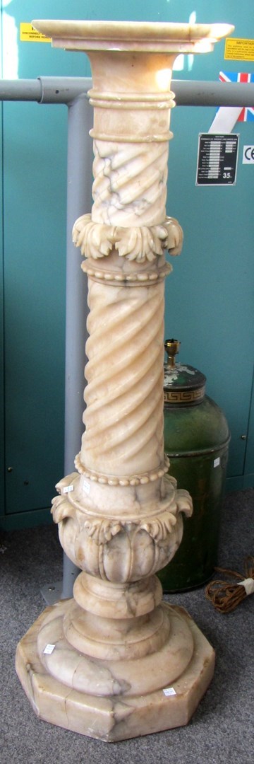 Appraisal: A marble jardiniere stand early th century the central column