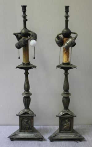 Appraisal: Pair of Probably Caldwell Metal CandlestickLamps with Gothic figures in