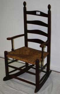 Appraisal: Early ladder-back armed finial top rocking chair in original dark