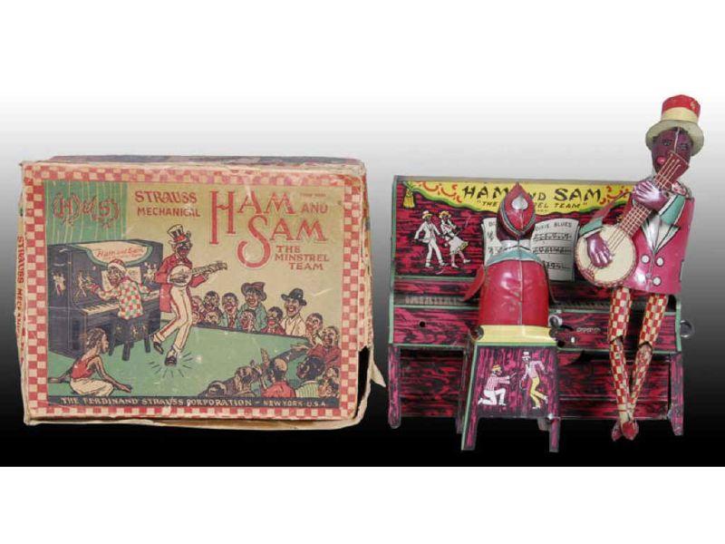 Appraisal: Tin Strauss Ham Sam Band with Original Box Description ''