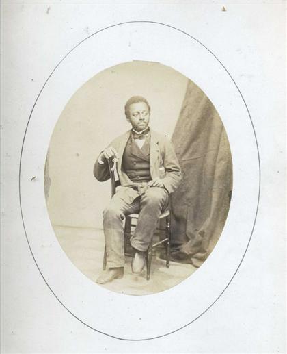 Appraisal: piece Original Photograph Seated bearded young African-American man with set