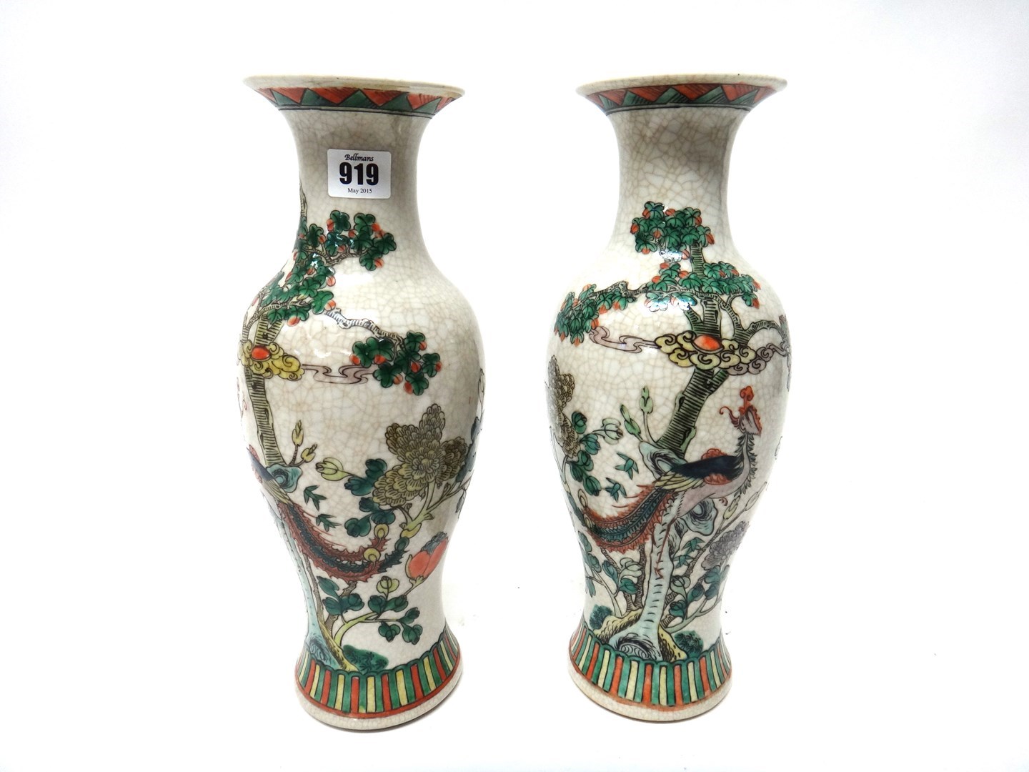 Appraisal: A pair of Chinese famille-verte crackle glazed slender baluster vases