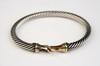 Appraisal: BRACELET - Sterling rope form bangle bracelet with K gold