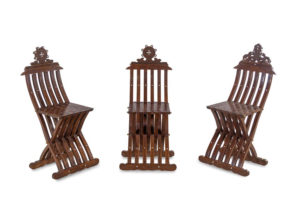 Appraisal: Three Syrian Mother-of-Pearl Inlaid Walnut Folding Chairs Three Syrian Mother-of-Pearl