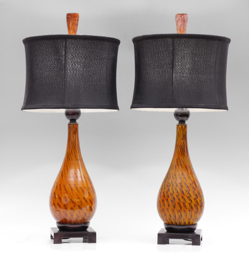 Appraisal: PAIR OF MURANO STYLE TABLE LAMPS Wood base amber glass