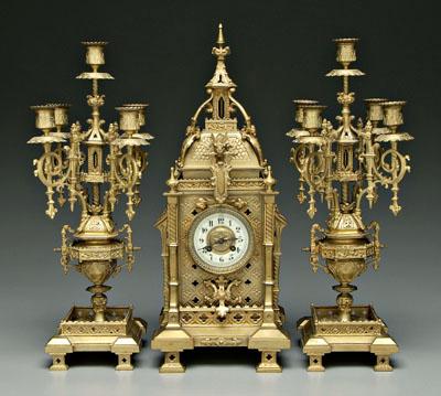 Appraisal: Gothic revival clock garniture bronze dor eacute clock French brass