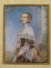 Appraisal: A three quarter length watercolour portrait of a lady in