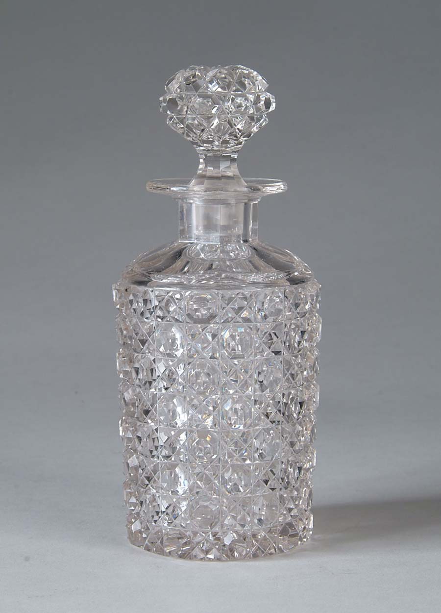 Appraisal: CUT GLASS SCENT BOTTLE Cane pattern with matching cut glass