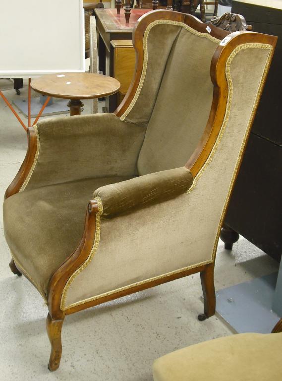 Appraisal: Late th century mahogany winged armchair upholstered in green Draylon