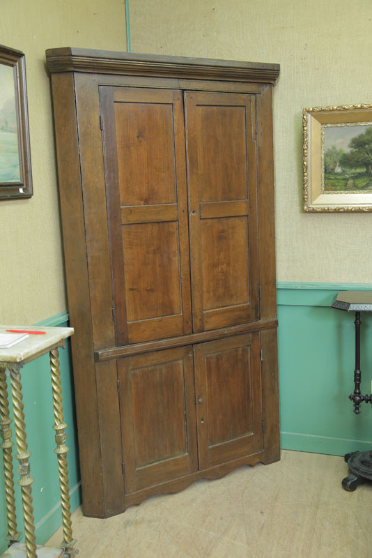 Appraisal: ONE PIECE CORNER CABINET Oak having a molded cornice blind