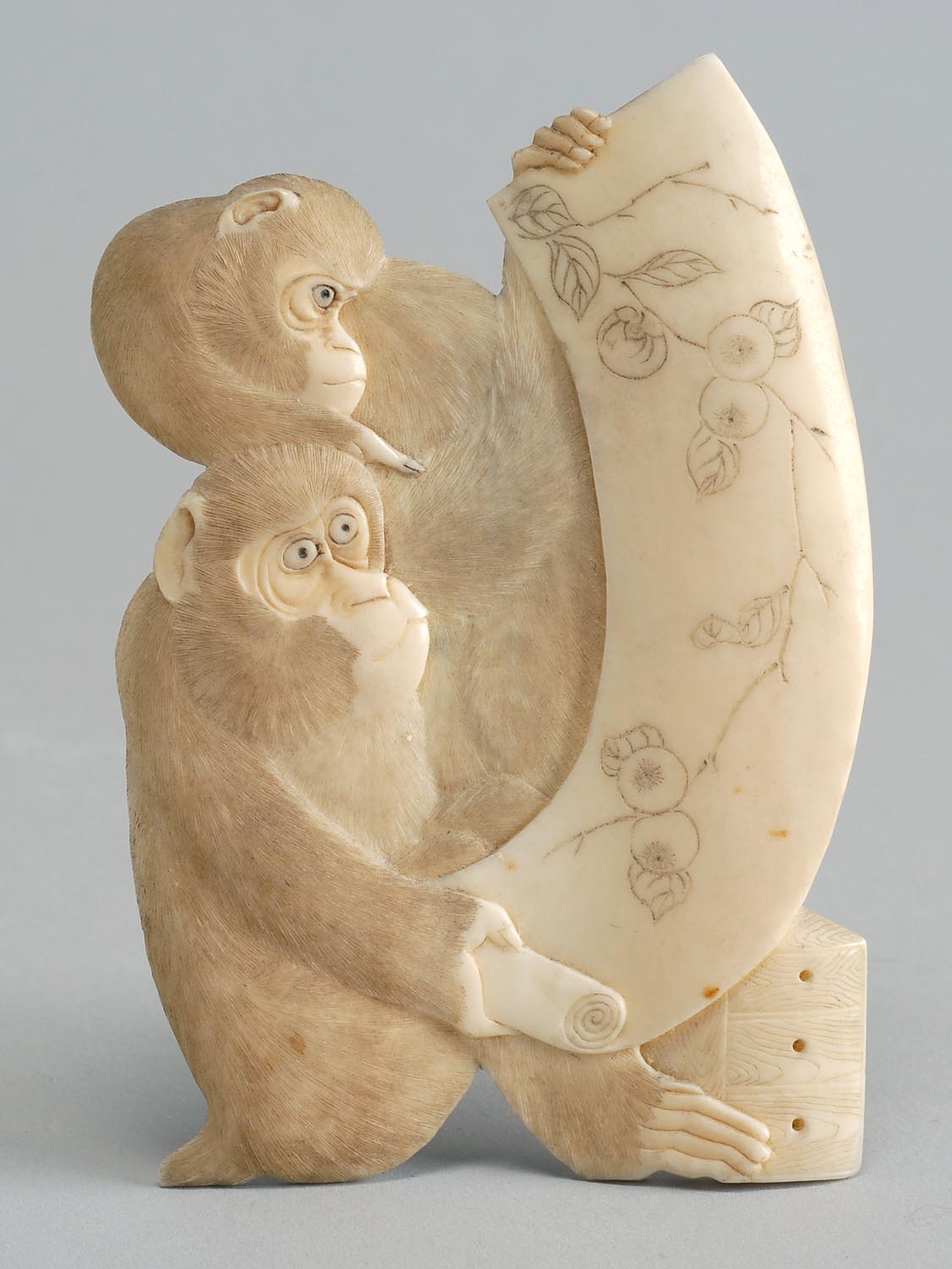 Appraisal: IVORY PLAQUE th CenturyIn the form of two monkeys examining