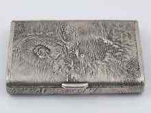 Appraisal: A Russian hallmarked silver cigarette case with samorodok finish makers