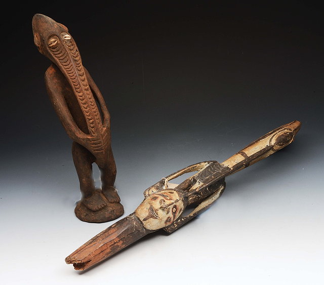 Appraisal: A SEPIK RIVER CARVED WOODEN FLUTE STOPPER of a painted