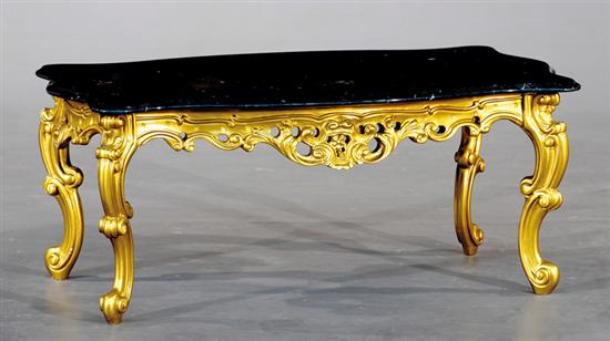 Appraisal: Continental marble and giltwood coffeetable serpentine black mottled marble top