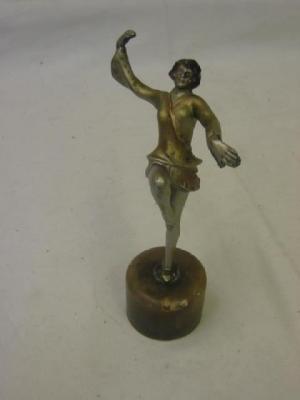 Appraisal: AN ART DECO SPELTER FIGURE modelled as a female dancer