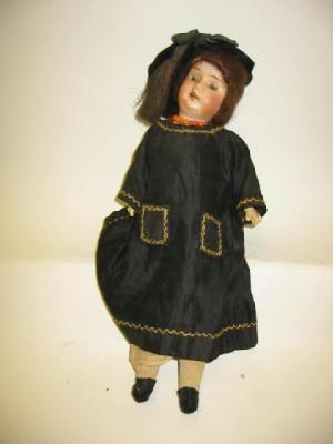 Appraisal: A Theodore Recknagel bisque head doll with blue sleeping eyes