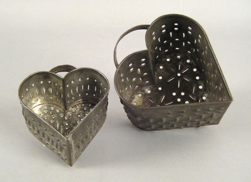 Appraisal: Two pierced heart form cheese molds th c h and