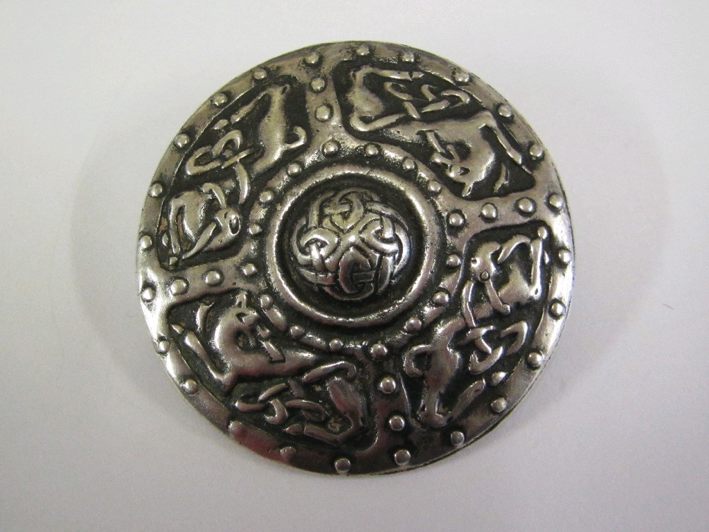 Appraisal: Alexander Ritchie silver shield brooch with central spiral knotwork boss