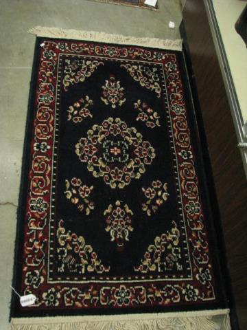 Appraisal: Hand tufted Oriental mat approximately ' x ' in traditional