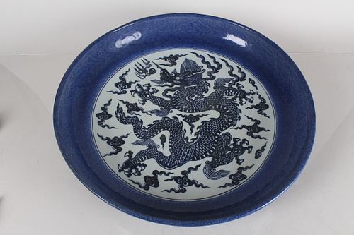 Appraisal: A CHINESE BLUE AND WHITE DRAGON-DECORATING MASSIVE PORC A Chinese