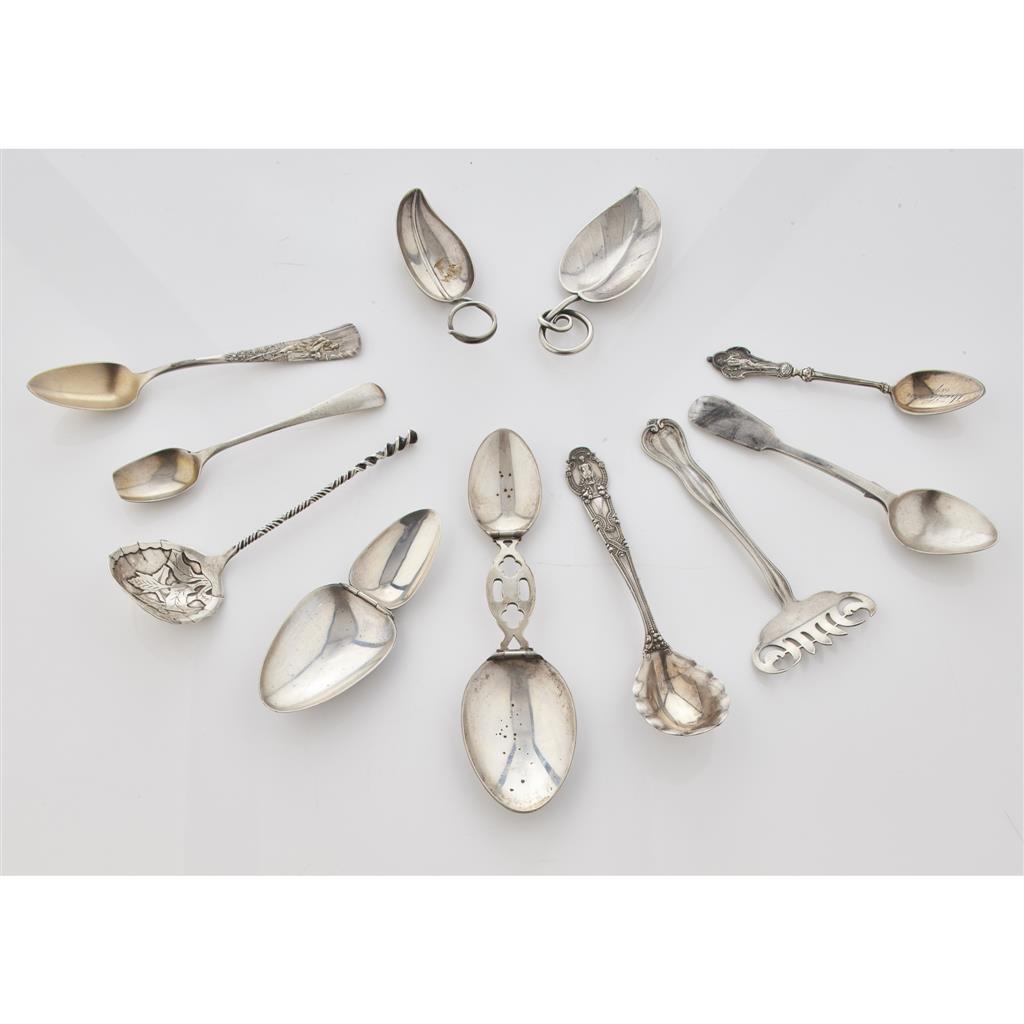 Appraisal: A group of American flatware to include two folding medicine