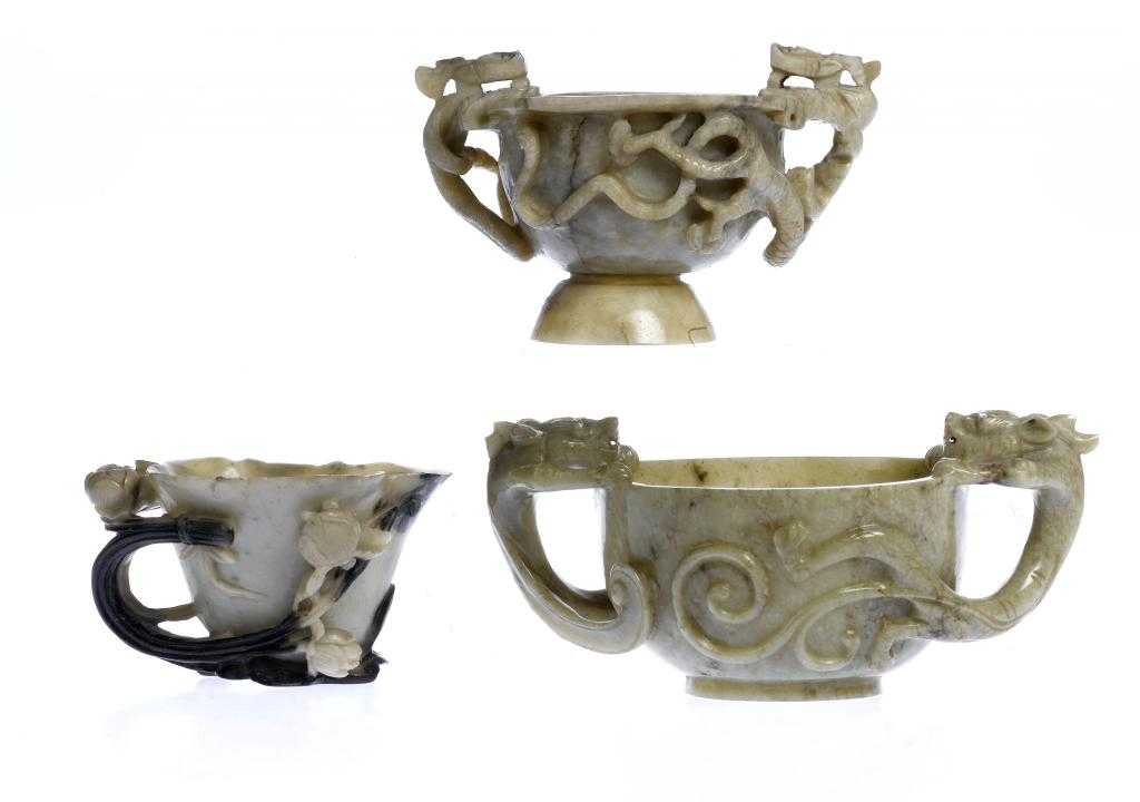 Appraisal: A CHINESE JADE MARRIAGE BOWL with carved chilong handles on