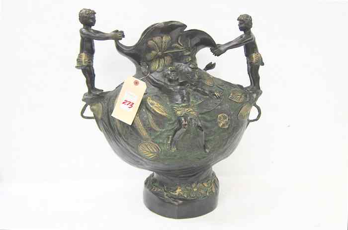 Appraisal: BRONZE FLOOR URN the footed ovoid vessel cast with overall