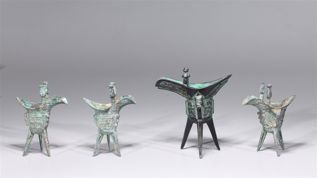 Appraisal: Group of four Chinese archaistic bronze wine vessels as-is condition