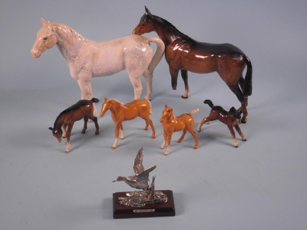 Appraisal: A Beswick brown horse a Sylvac grey horse two Beswick