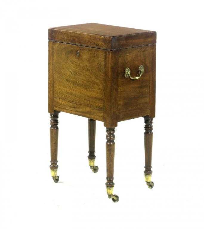 Appraisal: A GEORGE IV MAHOGANY CELLARET with fitted interior and brass