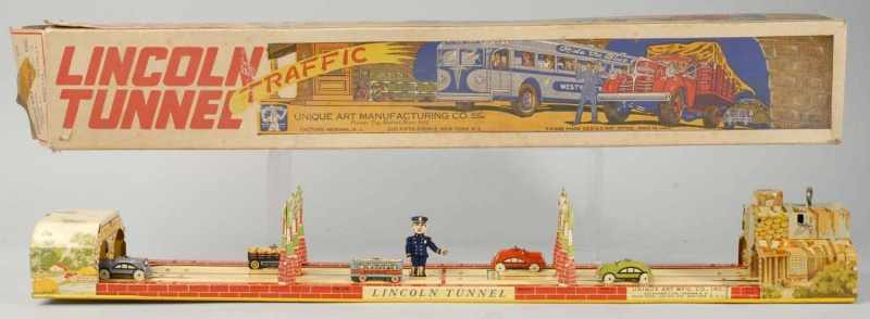 Appraisal: Tin Litho Unique Art Lincoln Tunnel Wind-Up Toy Description American