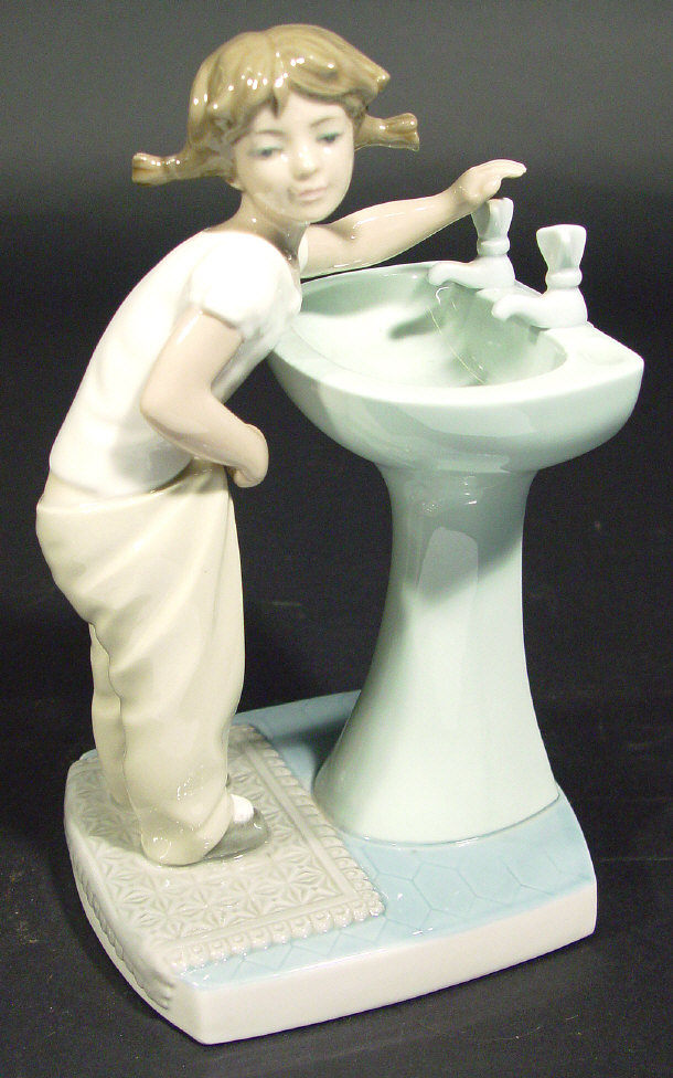 Appraisal: Lladro porcelain figurine 'Clean Up Time' printed factory marks and