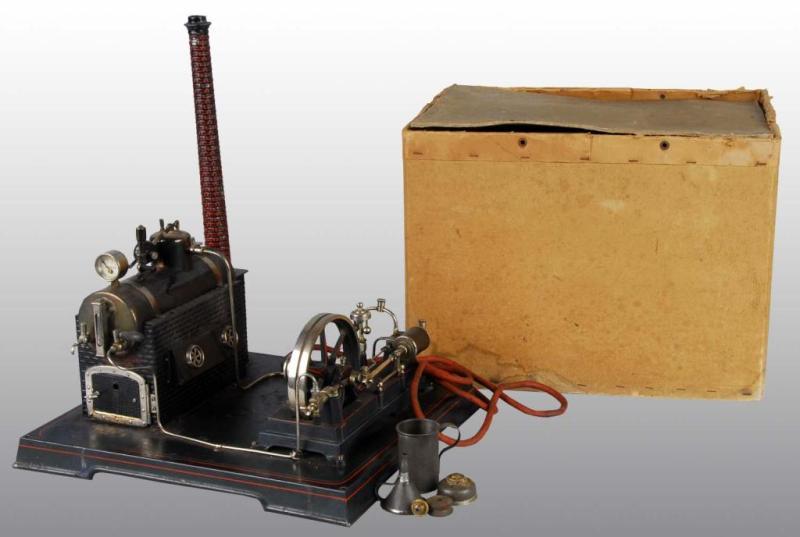 Appraisal: Doll No Horizontal Steam Engine in Box Description This engine