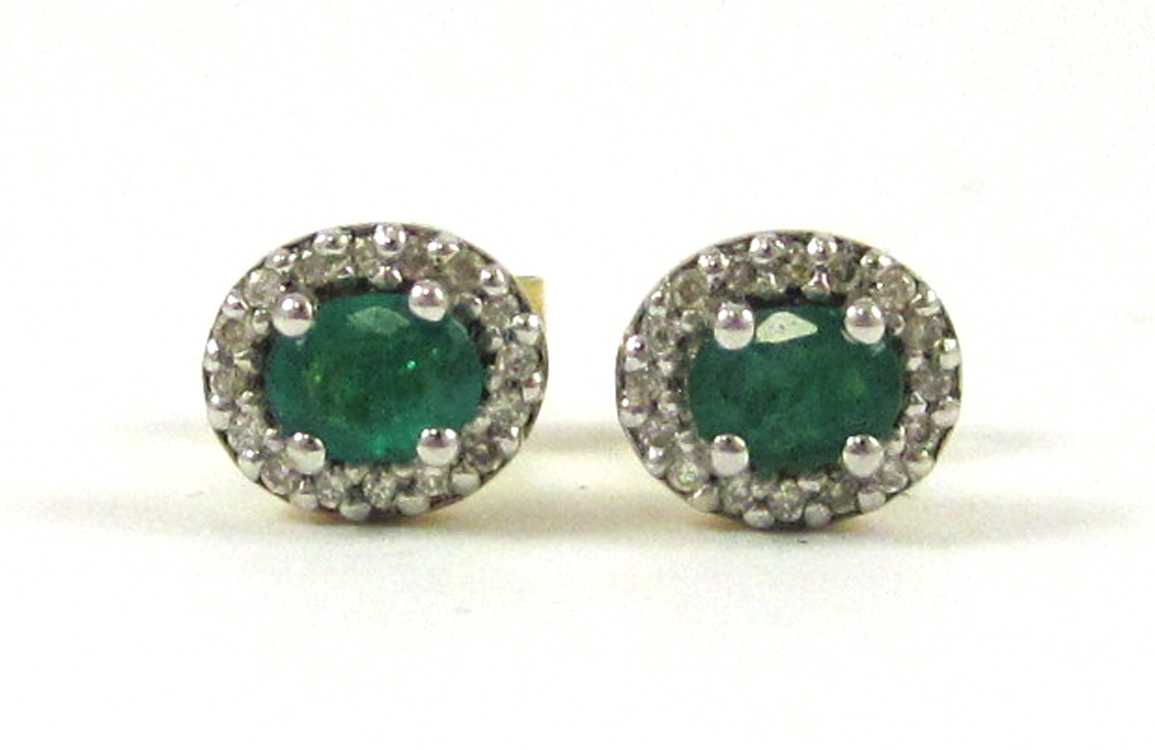 Appraisal: PAIR OF EMERALD AND DIAMOND STUD EARRINGS each k gold