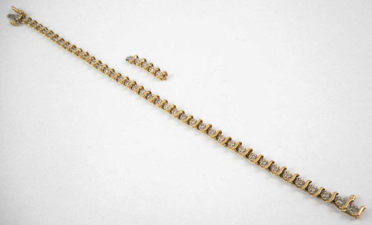 Appraisal: DIAMOND AND FOURTEEN KARAT GOLD BRACELET measuring - inches in