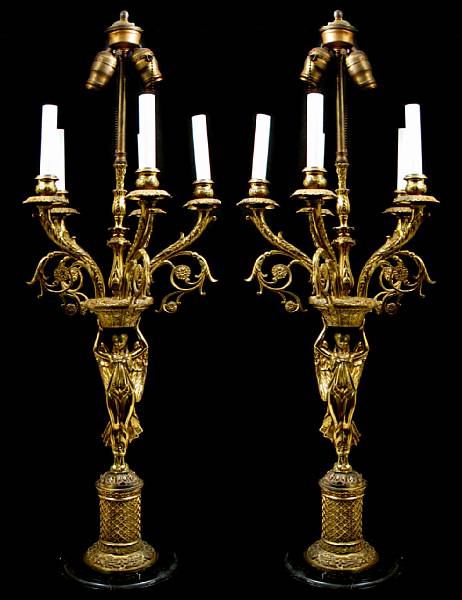 Appraisal: A pair of Empire style gilt metal candelabra now electrified