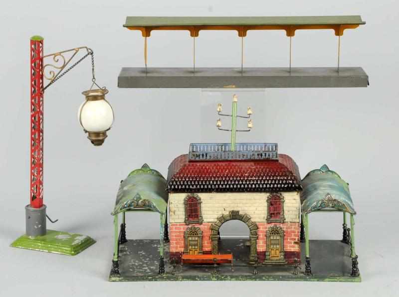 Appraisal: Lot of Tin Train Stations German Combination of hand-painting and