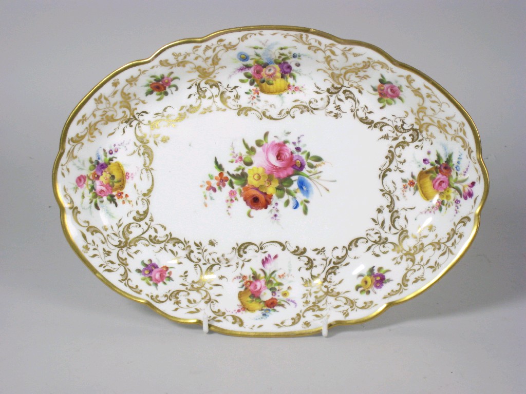 Appraisal: A Nantgarw porcelain oval Plate finely painted floral bouquets in