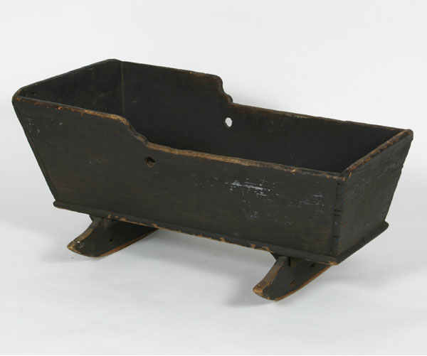 Appraisal: Primitive floor cradle with rocker base shaped sides H x