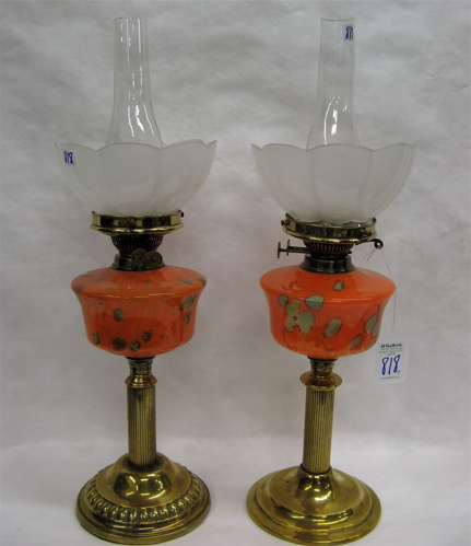 Appraisal: TWO ENGLISH KEROSENE TABLE LAMPS similar brass column bases both