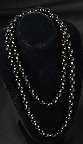 Appraisal: K Y Gold Onyx Necklace Condition Excellent Size L