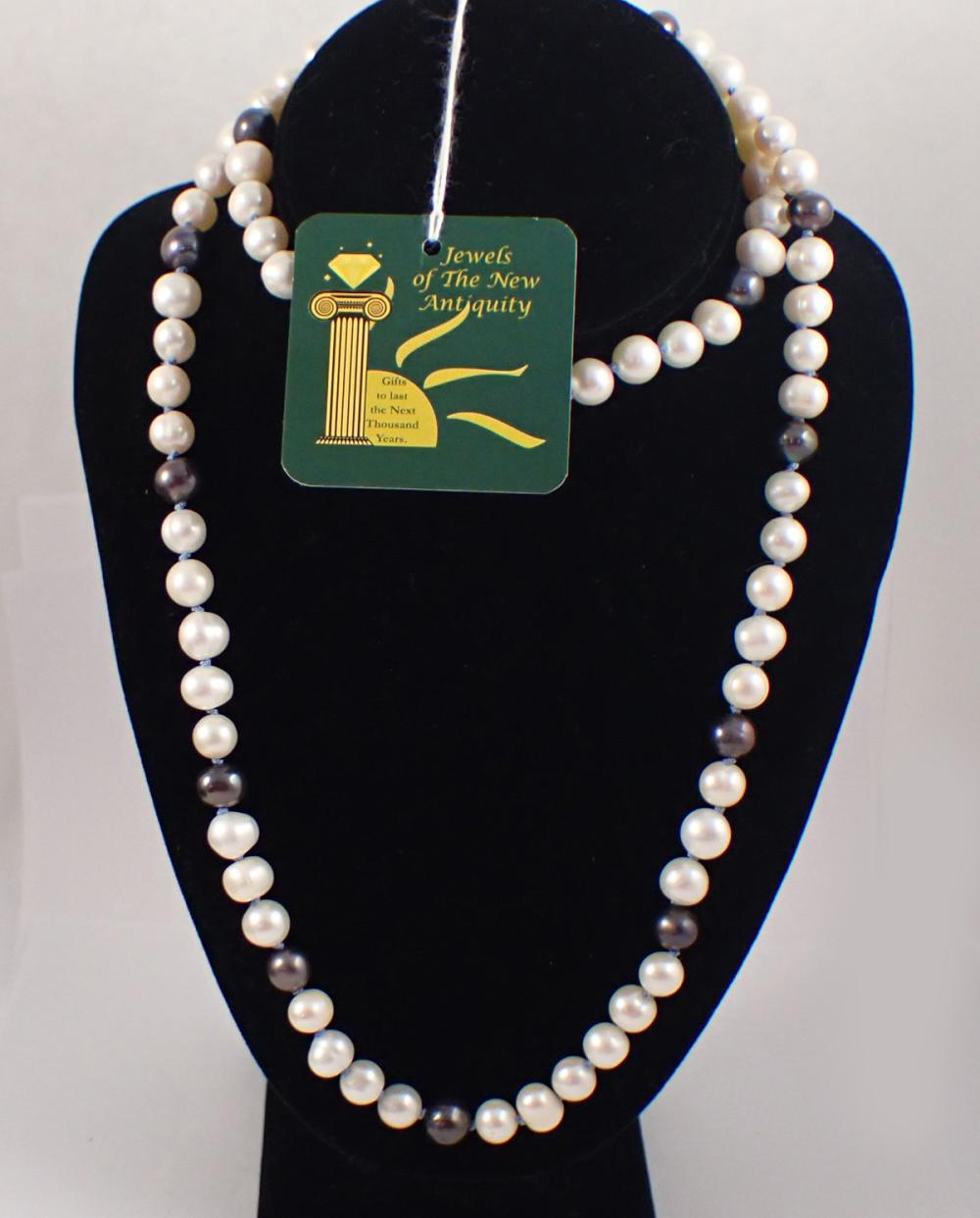 Appraisal: OPERA LENGTH WHITE AND BLACK PEARL NECKLACE - hand knotted