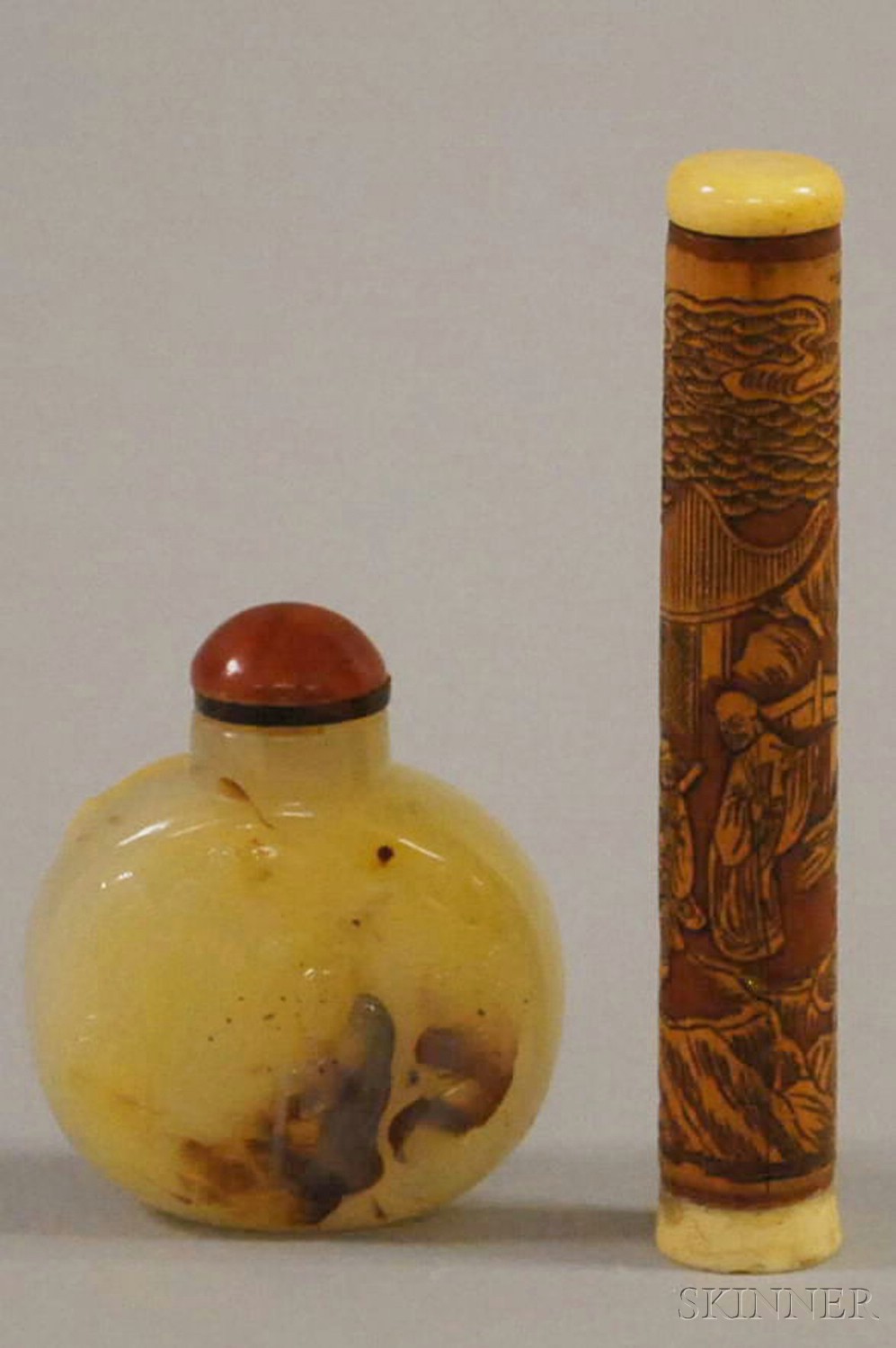 Appraisal: Two Snuff Bottles a cylindrical bamboo bottle with ivory stopper