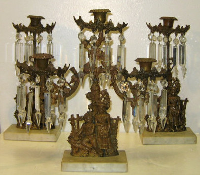 Appraisal: THREE-PIECE METAL GIRANDOLE GARNITURE A three-light candelabrum and pair of