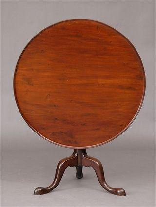 Appraisal: CHIPPENDALE MAHOGANY TILT-TOP TRIPOD TEA TABLE The circular shaped top