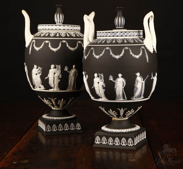 Appraisal: Near-pair Wedgwood black white jasperware vases Near-pair Wedgwood black white