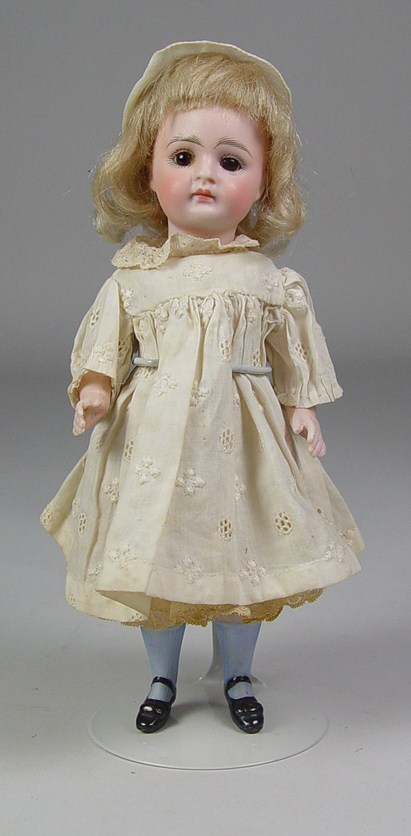 Appraisal: German All-Bisque Girl Brown set glass eyes very pale smooth