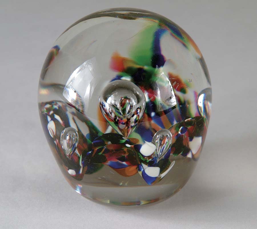 Appraisal: AMERICAN ART GLASS PAPERWEIGHT Paperweight features spatter glass colors of